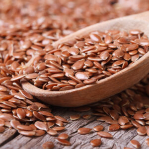 Flax,Seeds,Close,Up,On,A,Wooden,Spoon,On,A Flaxseed Extract Powder