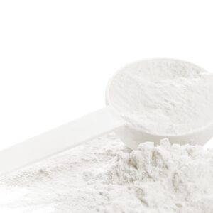 A closeup scoop of Creatine powder